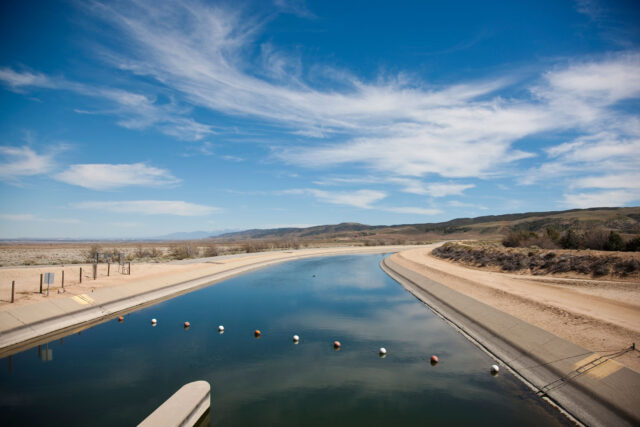photo - California Aqueduct with Mountains in Background