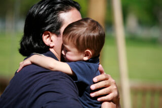 photo - Father Hugging Son
