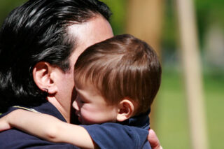 photo - Father and Son Hugging