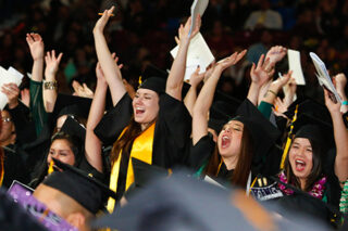 FemaleGradsCelebrating