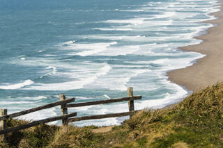 photo - Wooden Fence on a Cliff by the Pacific Ocean