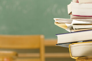 Pile Of Books On A Desk