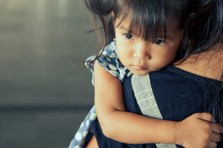 Photo of child with Mom