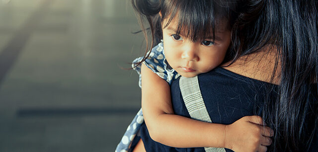 Photo of child with Mom