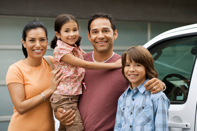 Hispanic Family By Car