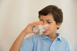 Boy Drinking Water