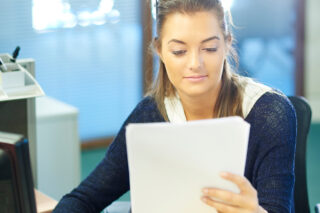 Woman At Desk with Computer