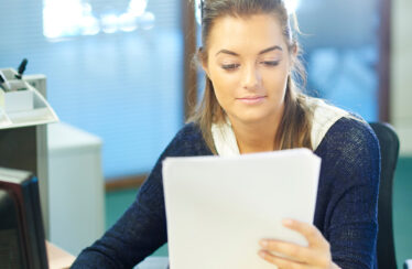 Woman At Desk with Computer
