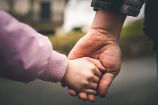 photo - father and daughter holding hands