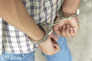 photo - man in handcuffs