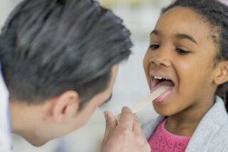 Doctor and child during visit