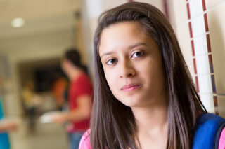 Serious Young High School Or College Student On Campus