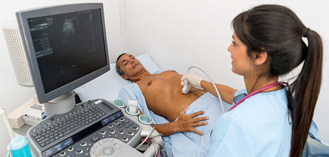 Radiologist Doing A Sonogram At The Hospital