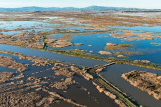 photo - Aerial shot of floodplain