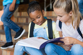 School Girls Studying Together After School