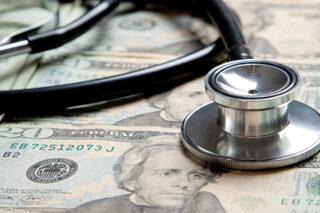 Stethoscope On $20 Bill Background