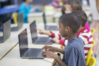 photo - Student on Laptop