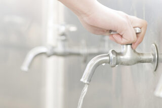 Hand turning faucet on