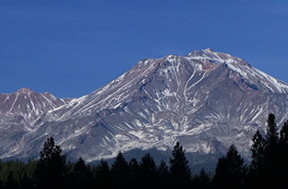 Photo of mountain with minimal snow
