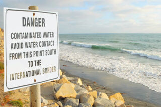 Photo of water contamination sign at beach