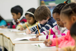 photo - Elementary Students at Desks Taking Test