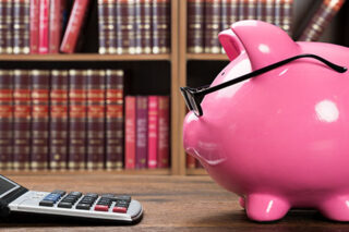 photo - Pink Piggybank and Calculator
