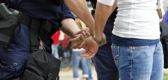 photo - Arrest of a Woman
