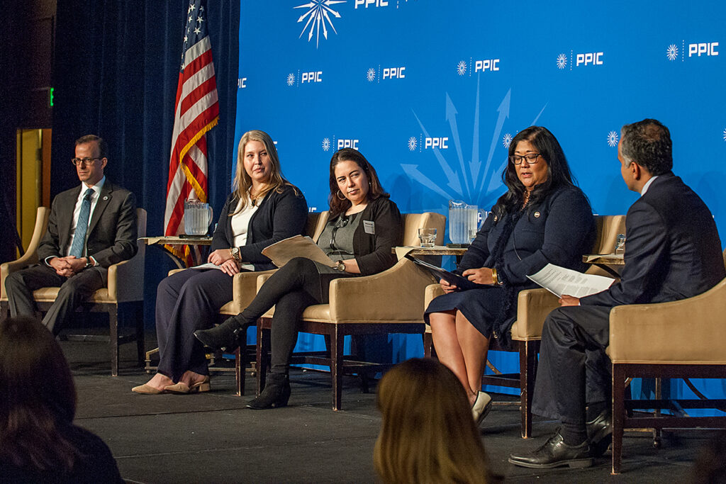 Photo of panelists on stage