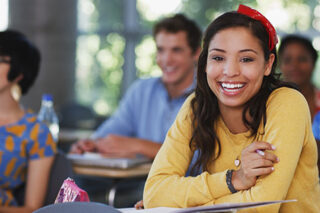 photo - College Students Smiling in Classroom