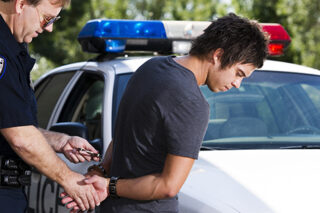 Officer Arresting Man