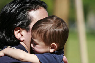photo - Father and Son Hugging