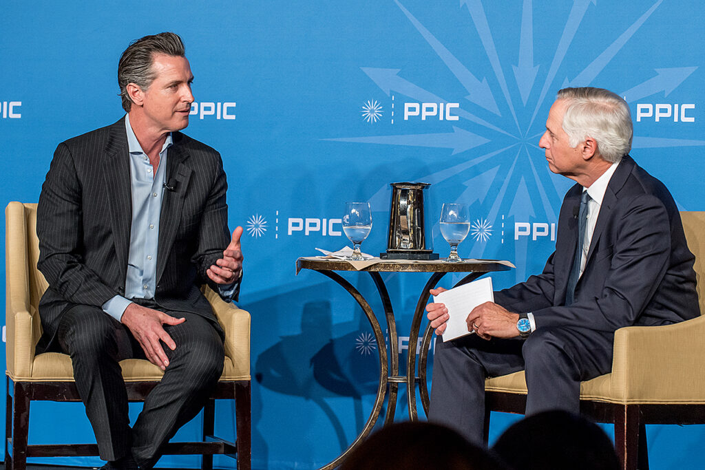 Photo of Governor Gavin Newsom and Mark Baldassare