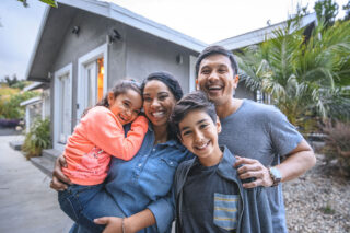 photo - Family Portrait in Front of House