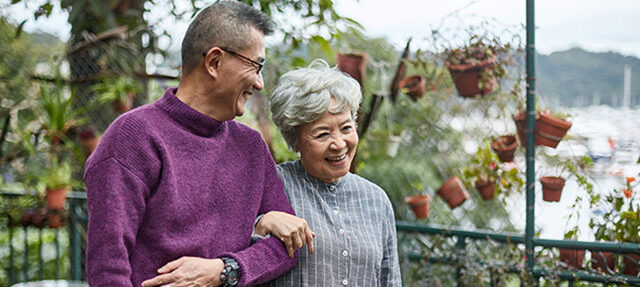 photo - Senior Couple Walking Together