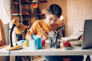 boy at desk