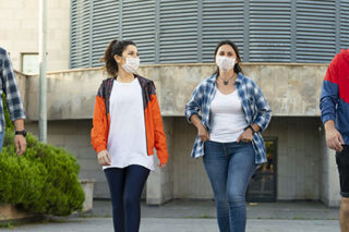 photo - 17-Year-Olds Wearing Mask and Walking in Line