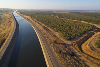photo - California Aqueduct Running Along Almond Farms