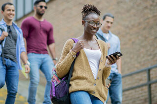 photo - College Students Walking Down Stairs