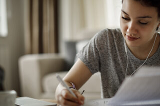 Young Woman Working At Home