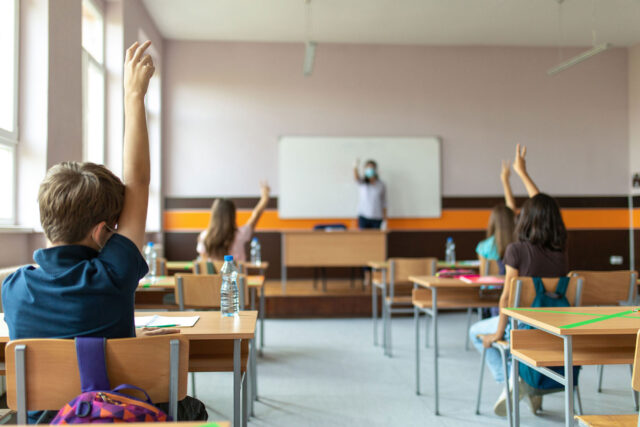 Photo - Teacher and students in classroom