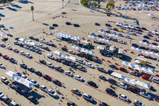 Aerial Of Covid 19 Vaccine Distribution In Parking Lot
