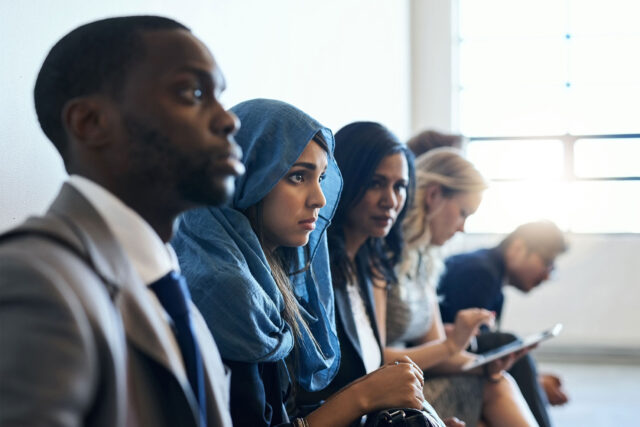 photo - People Sitting in a Row