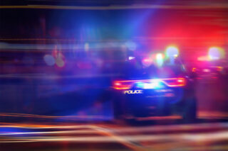 photo - Police Car at Night