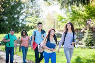 photo - Group of Students Walking to Class on College Campus