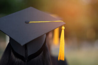 photo - graduate wearing mortar board