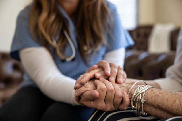 photo - Senior Woman at Home Receiving Healthcare