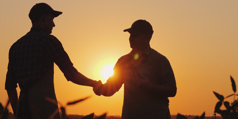 photo - Farmers Shaking Hands in Field