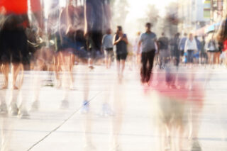 photo - Motion Blurred Pedestrians on Boardwalk