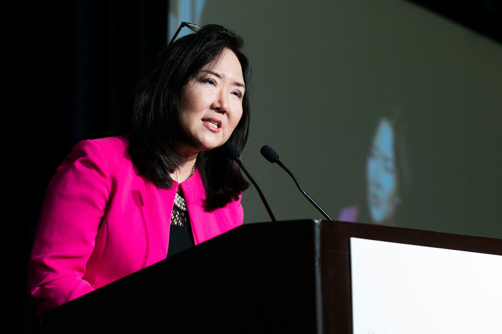 photo - A. Marisa Chun welcomes the audience