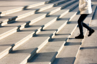photo - Student Climbing Stairs